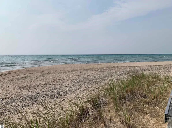 410 S Golden Beach Dr, Kewadin, MI 49648