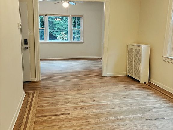Living with Original details pre-war hardwood floors abd Tin ceilings