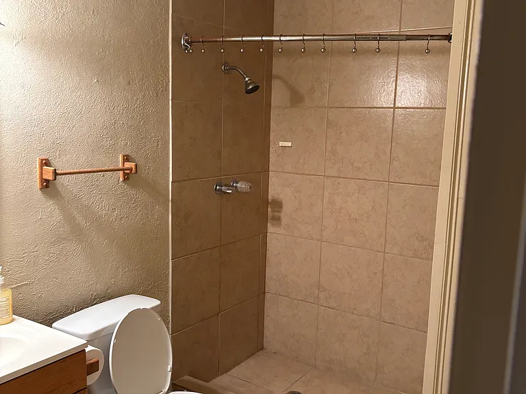 Bathroom adjacent to master bedroom.