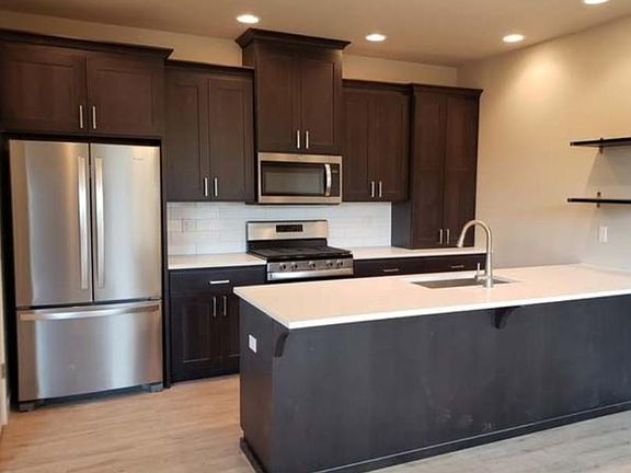 kitchen with upgraded appliances (gas stove).