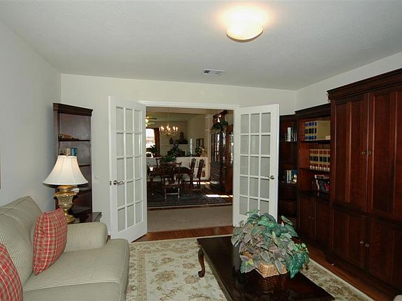 French doors lead to the spacious study.