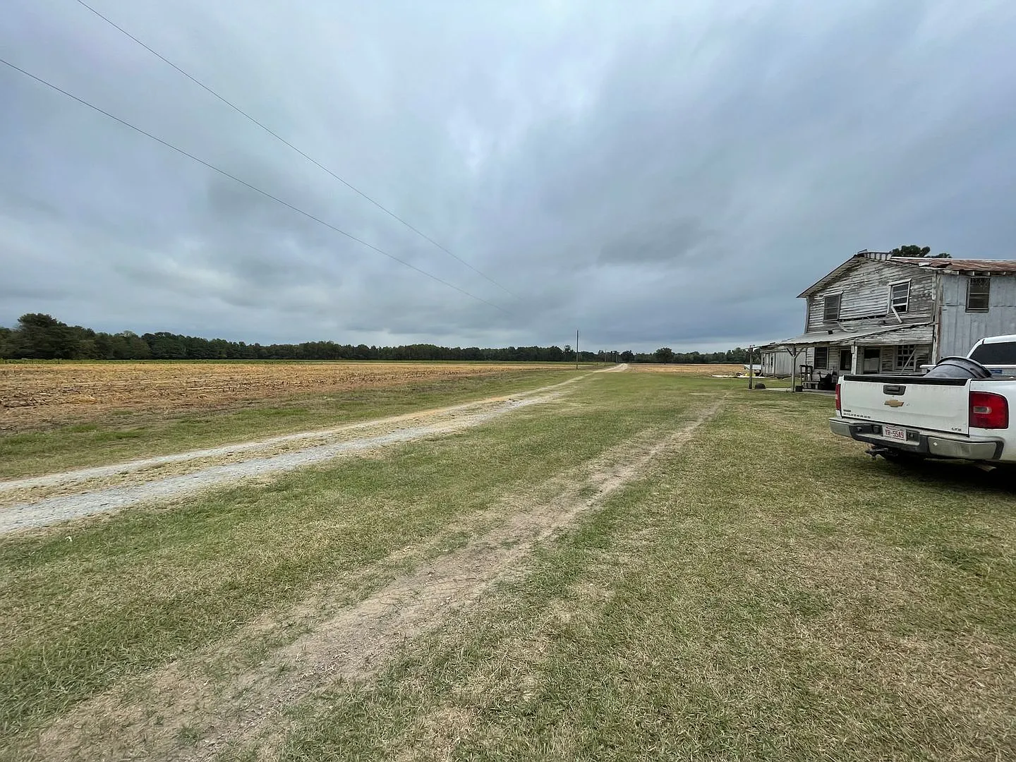 County Quiet Setting- Doublewide- Split Floor Plan with Deck- Grass, Water, Sewer included — Photo 3