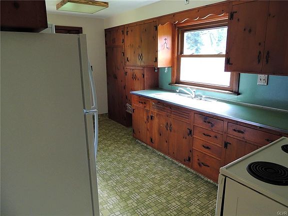 Charming original pine cabinetry in the kitchen.