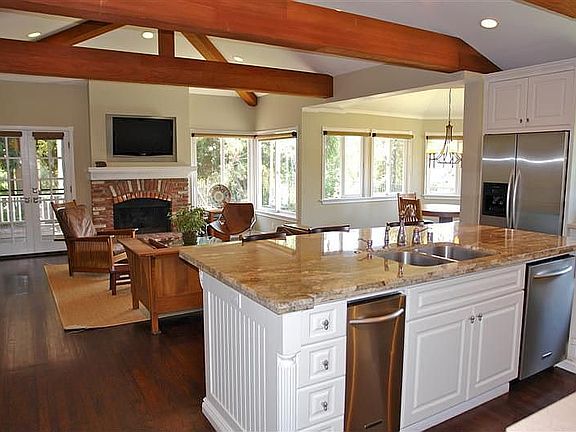 Kitchen open to Family Room with Vaulted, Beamed Ceilings