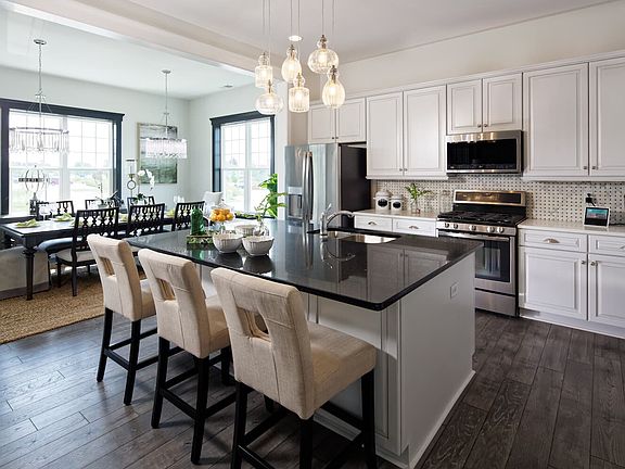The kitchen of the Savoy II by Brookfield Residential