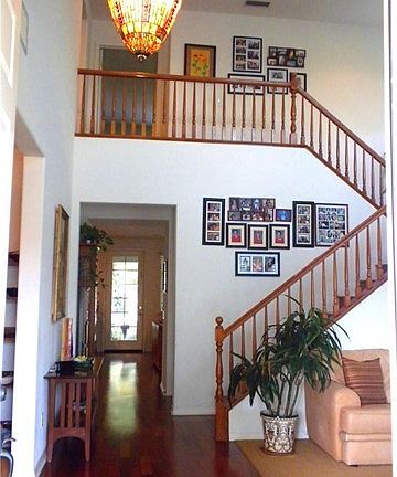 Stained chandelier highlights the vaulted foyer.