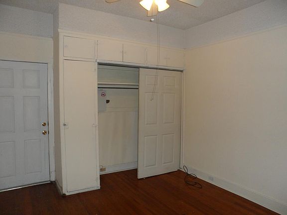 Bedroom, closet, rear door