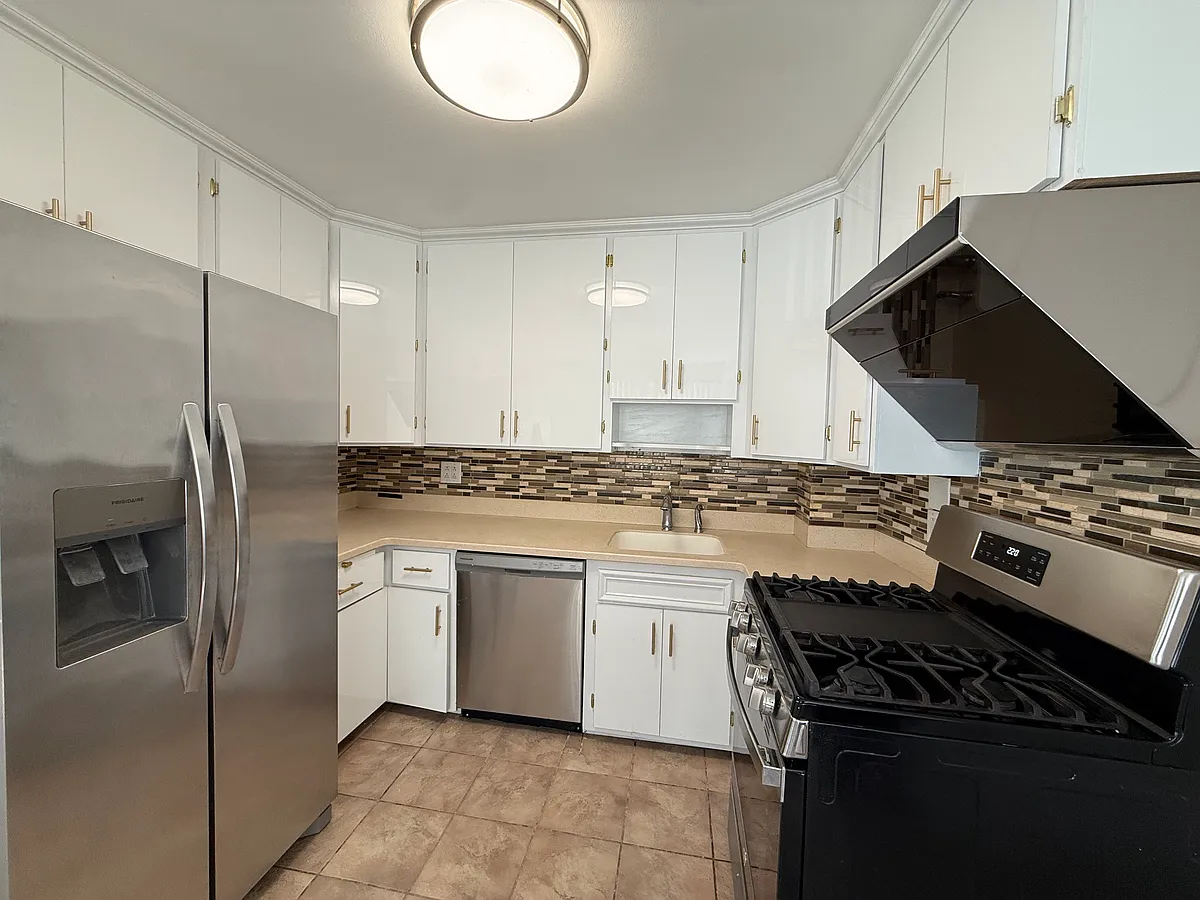 Building Photo - 23-43 120th St #1