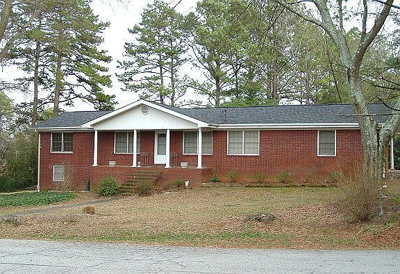 Front view of this 4 side brick ranch