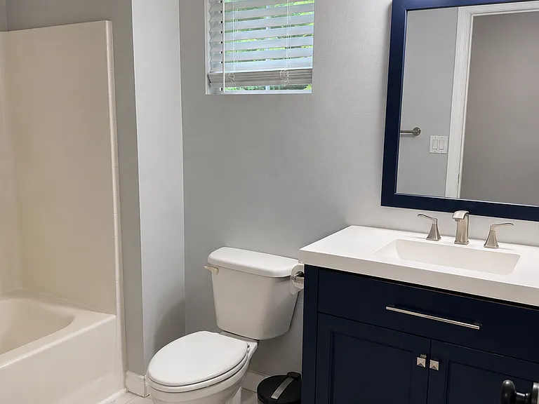 Upstairs full bathroom: shower + tub between the bedrooms.
