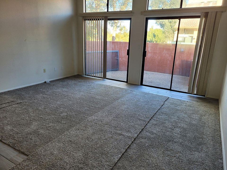 Living area with access to outdoor patio