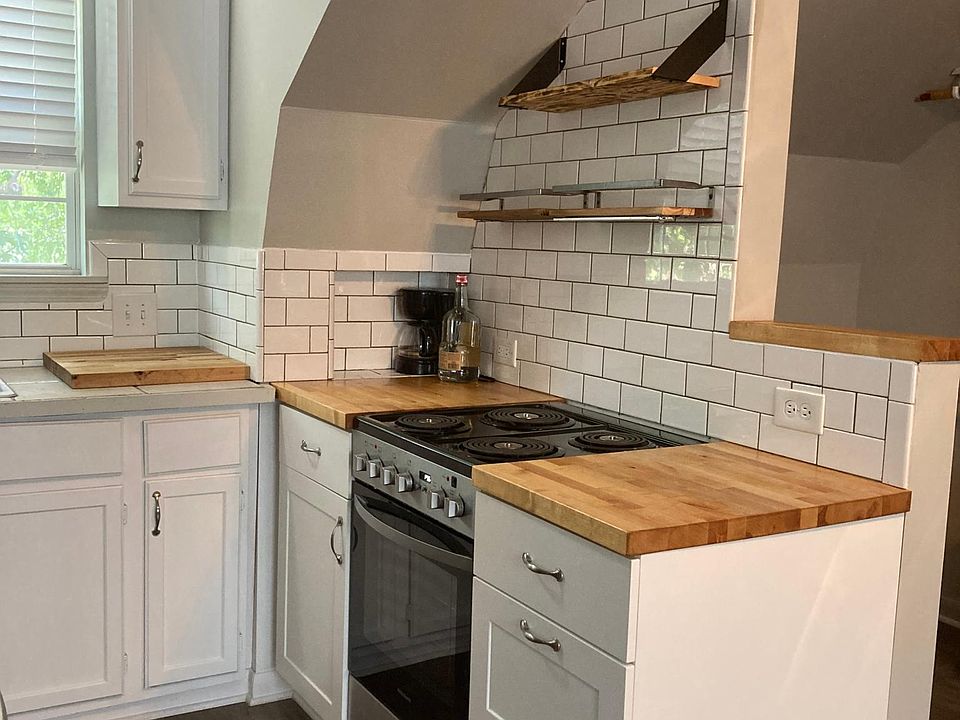 Electric range, shelving and butcher block countertops