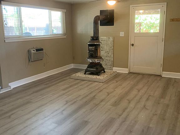 livingroom, standing wood fireplace