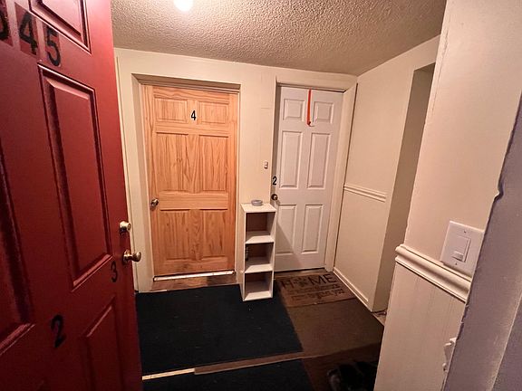 Apartment Door from Academy St Entrance.