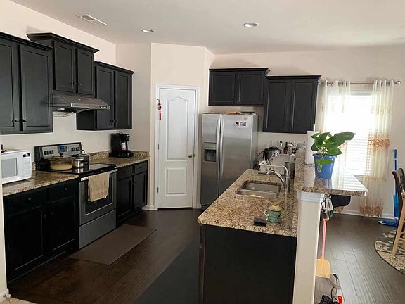 Granite countertop and SS appliances
