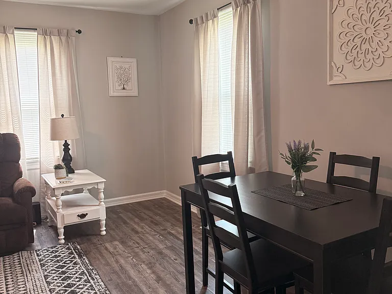 Large living room with Dining Table, 
Smart TV, Reclining Couch. Wifi included.