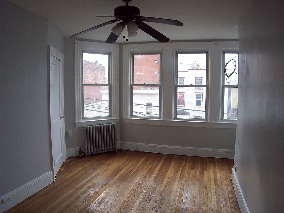 living room with bay windows