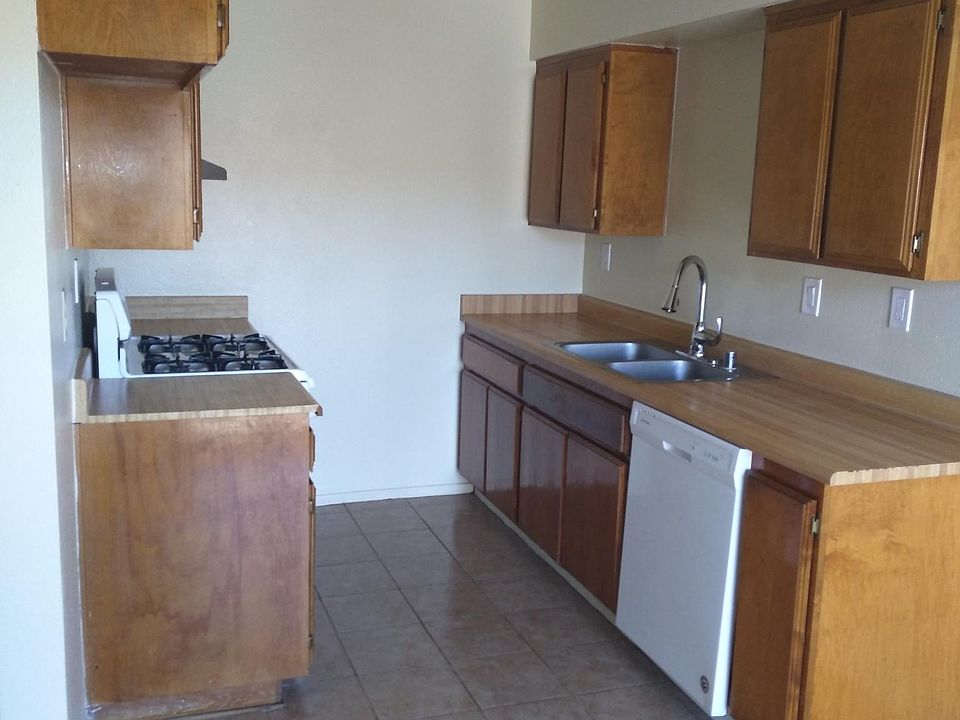 Kitchen comes with gas range and dishwasher