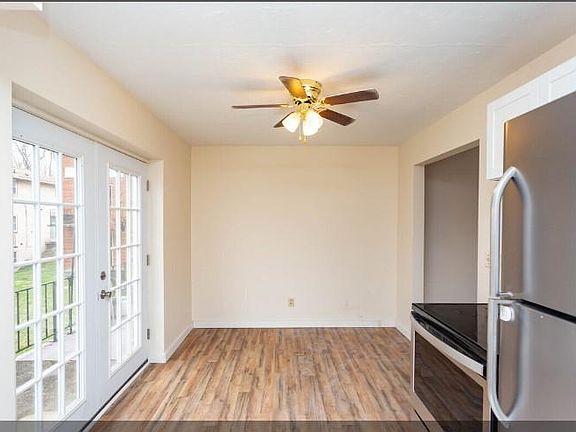 Kitchen comes equipped with stainless appliances. French doors lead to your balcony!
