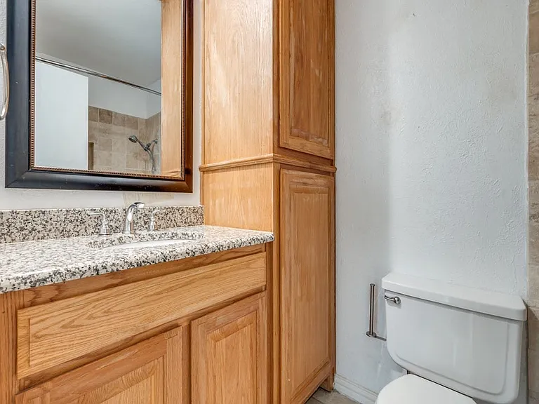 Guest bathroom with good storage.