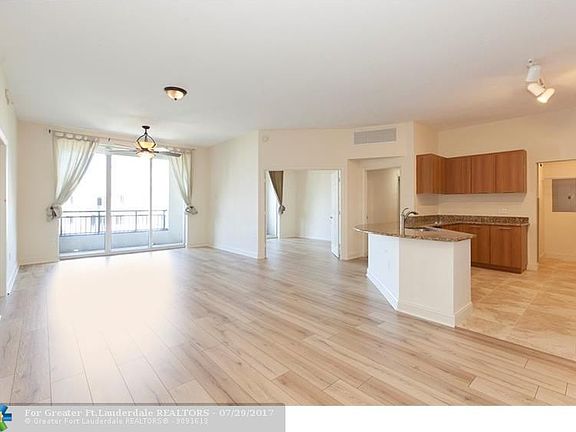 Light, bright top floor private "penthouse" - Exotic Spanish River Oak, commercial grade wood laminate flooring, imported from G
