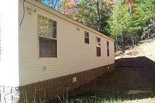 Situated on 2 acres, the backyard has lots of potential!