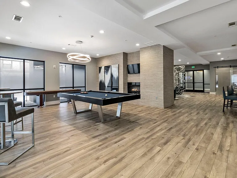 Challenge family and friends to a game of billards in the clubhouse.
