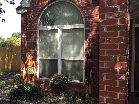brick front facade and new siding