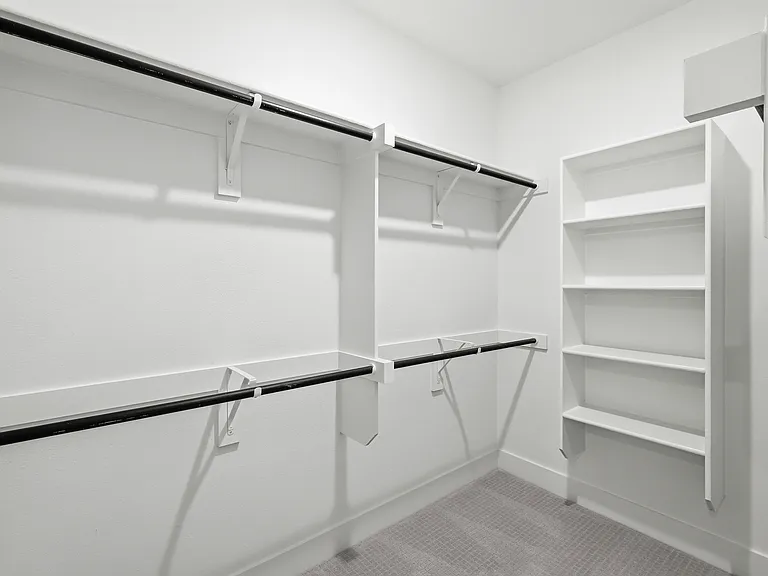 Oversized primary walk-in closet
