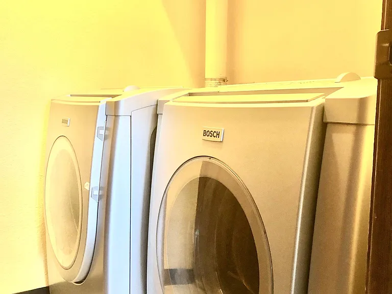 Laundry room with shelving