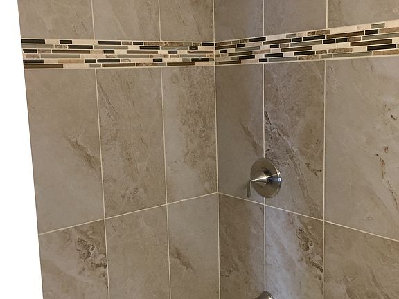 New tile shower main bath