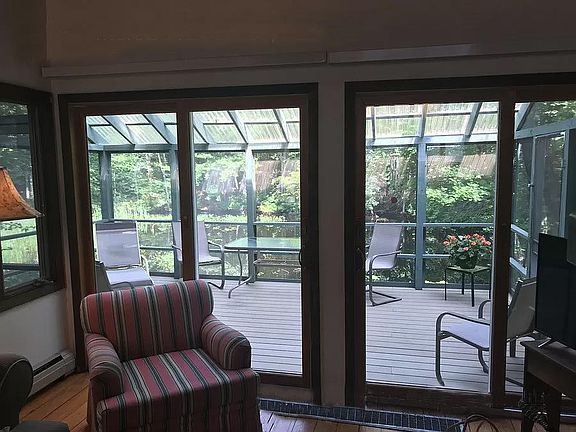 Living room looking out to back porch