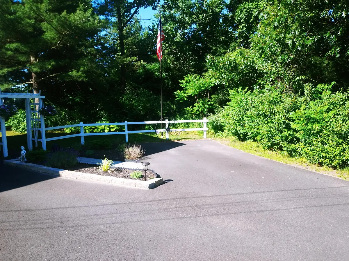 This is the assigned parking spot for the tenant. - 22 Laura Dr
