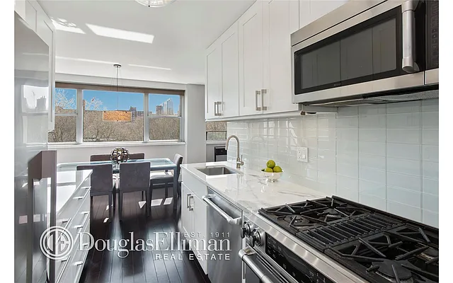 Sold by Douglas Elliman | media 13