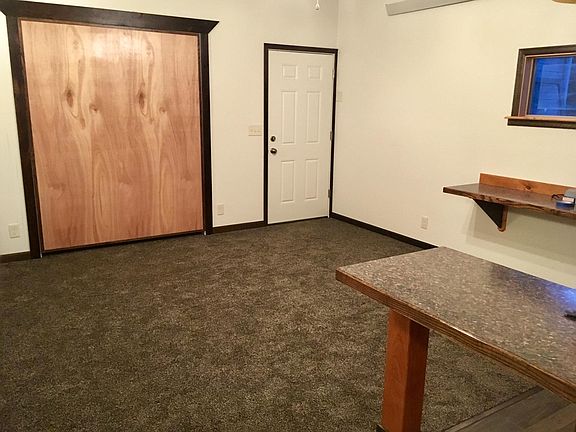 Built in Queen size murphy bed, rear entrance