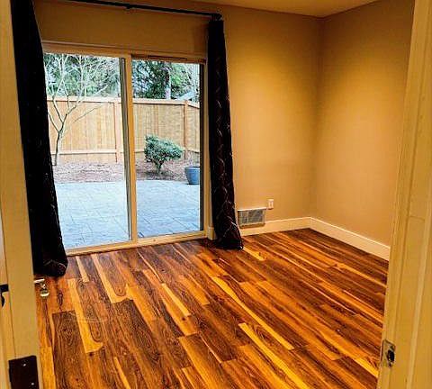 First floor office/bedroom, leading to backyard