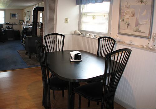 Lowel Level Dinette Area & Family Room w/Wood Stove