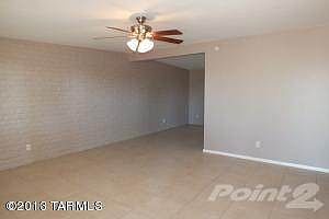 Living room w/dining area in back