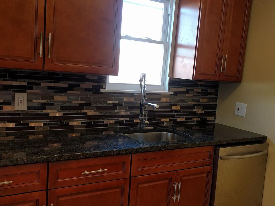 Remodeled kitchen with new cabinets and granite counter top