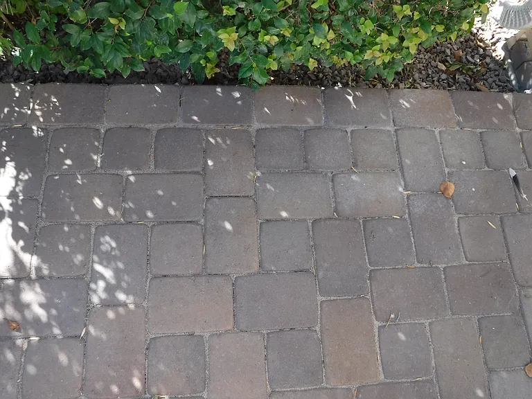 Paver patio in front of condo.