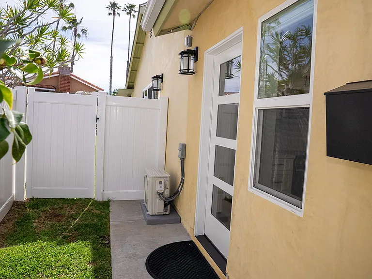 Private front entrance with patio area
