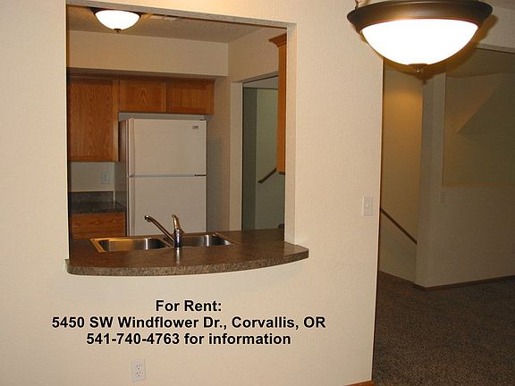 Passs through from kitchen to dining area.