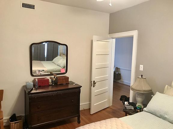 Bedroom with walk-in closet