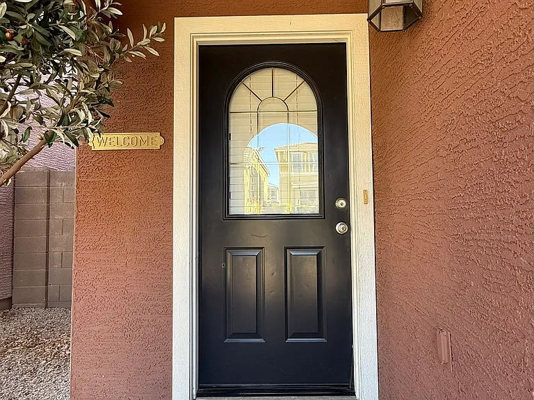 Welcoming entry with charming curb appeal and thoughtful designer details.