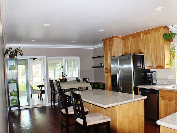 Kitchen opens to dining area