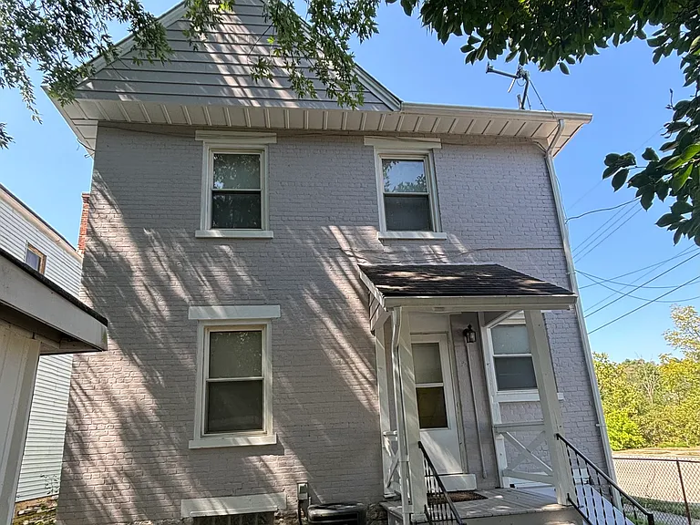 Private entrance to first floor unit with backyard shed, fenced yard & lots of street parking.