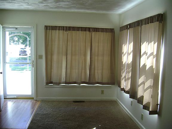 Inside there is a large sunny livingroom