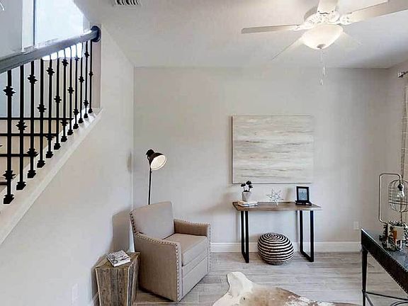 Sandalwood 3-Car New Home Den and Stairs to Second Floor