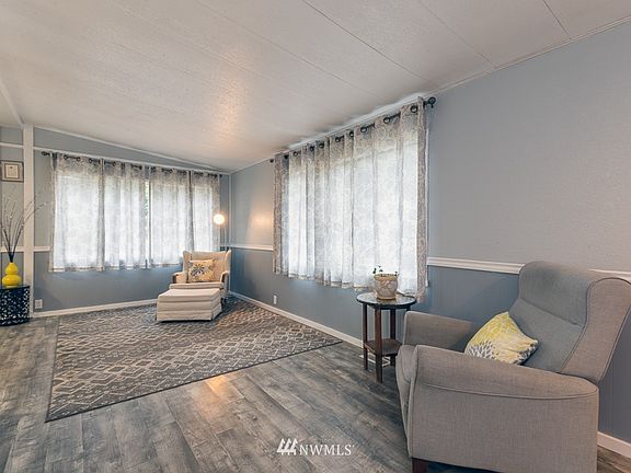 Living room with newer vinyl flooring