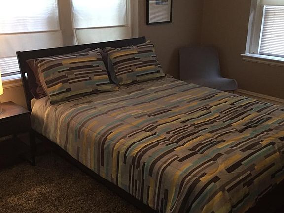 Masterbedroom displayed with furniture